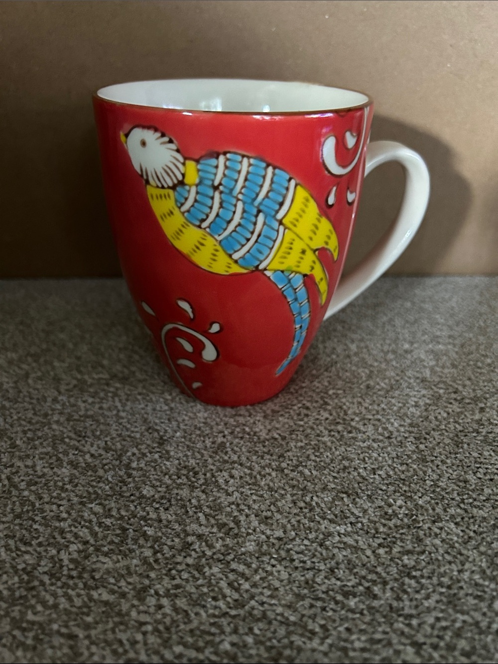 Cost Plus World Market Red Parrot Ceramic Mug with Blue and Yellow Accents